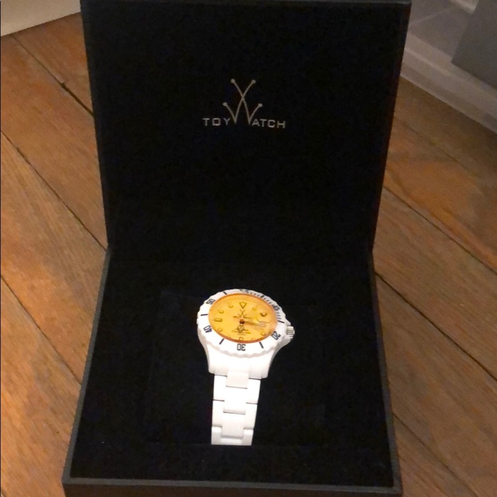 White ToyWatch never worn with yellow/orange face